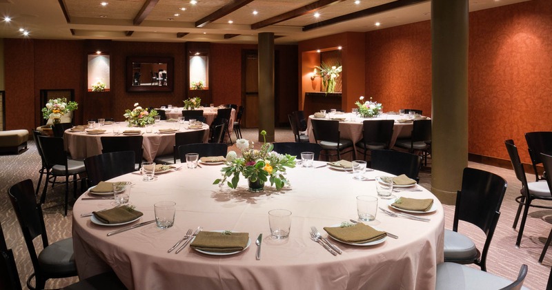 Interior, round tables in dining area