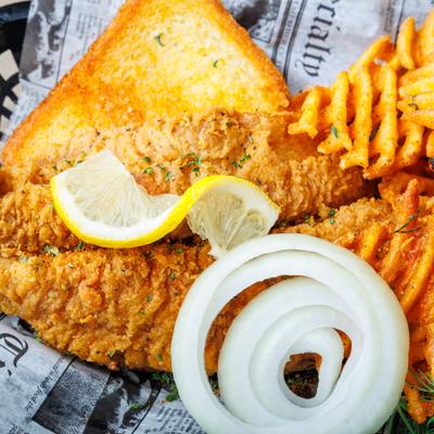 Fried catfish, with waffle fries and toast.