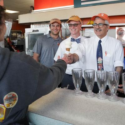 Doumar family serving an ice cream cones.