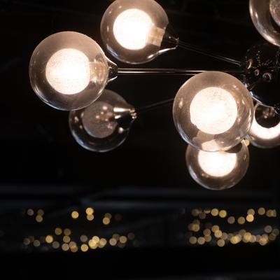 Chandelier featuring multiple glass sphere shades.