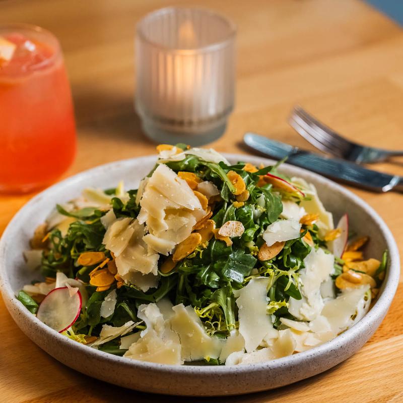 menu item 5 of 22, Seasonal Greens, Radish, Almond, Parmigiano, Raisin, Lemon