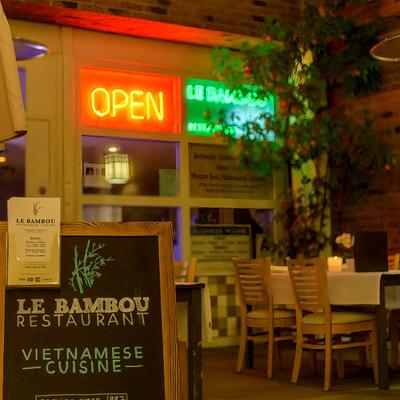 The entrance to the restaurant, outdoor seats.