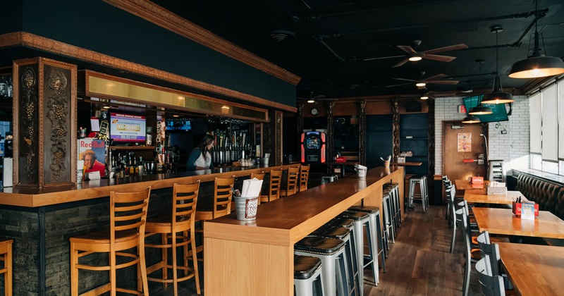 Dining tables on the right, bar area on the left