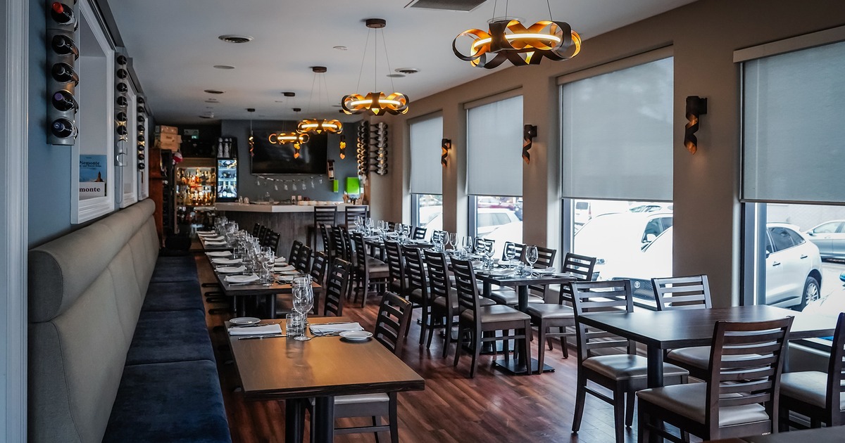 Restaurant interior, dining area with set tables