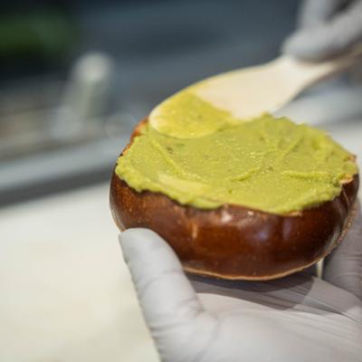 Hands preparing food.