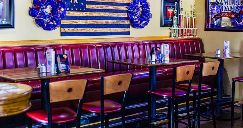 Interior, bench seating with high tables and chairs