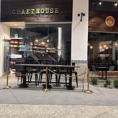 Outdoor seating area, tables and chairs.