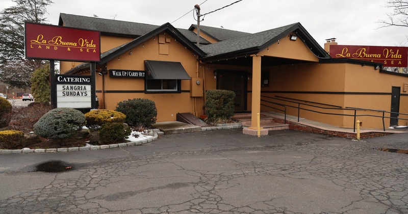 Exterior, front view of restaurant, entrance with a parking lot
