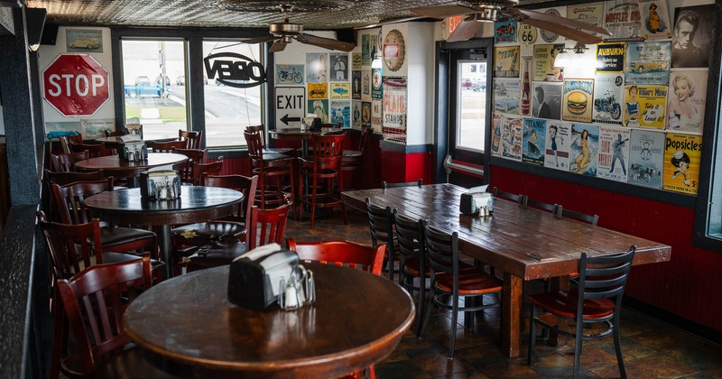 Inside, seating area with tables and chairs