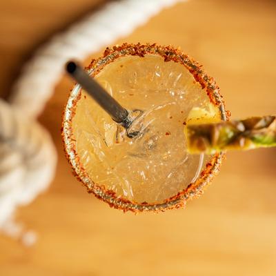 Pineapple cocktail with chili rim.