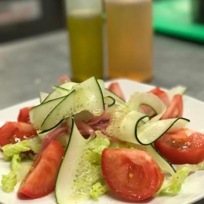 Lettuce, cucumber, and tomato salad.