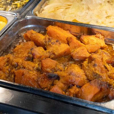 Food in serving containers, closeup.