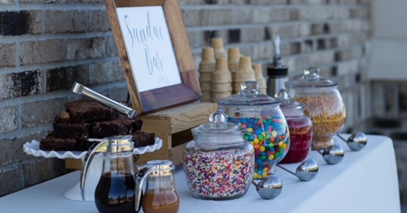 Chocolate brownies and various toppings