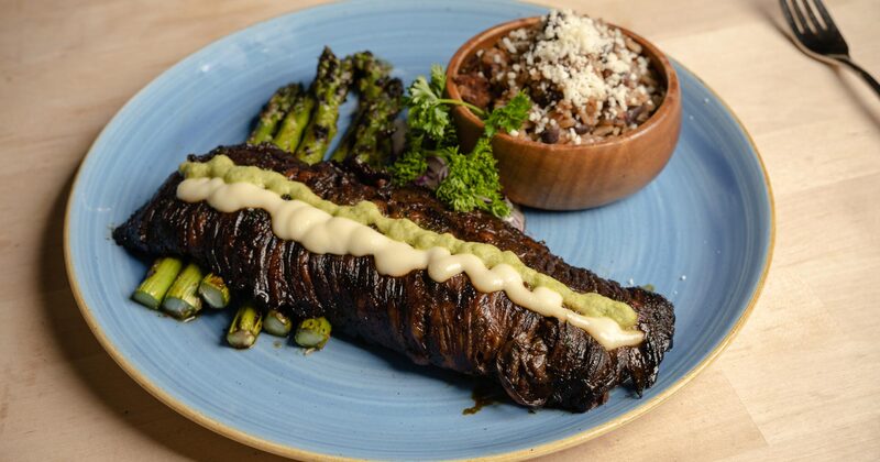 Grass fed skirt steak marinated in citrus mushroom soy, stuffed with wild mushrooms and onions
