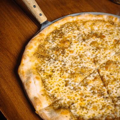 Cheese and pesto pizza.