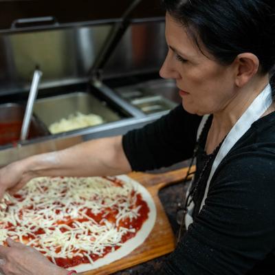 Pizza preparation process.