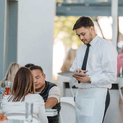 Employee tending to customer.
