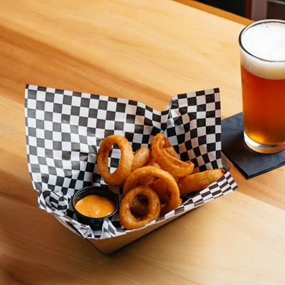 Whiskey - Battered Onion Rings and a glass of beer.