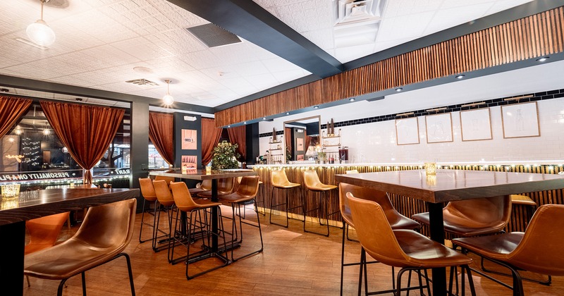 Restaurant interior, seating area with tables and chairs