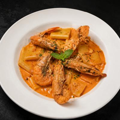 A creamy tomato shrimp penne pasta.