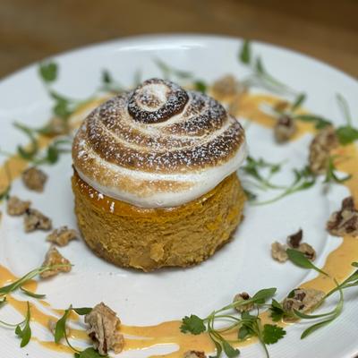 Pumpkin cheesecake, Swiss meringue, pistachio brittle.