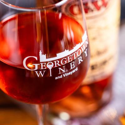 A close-up of a glass of rose wine from Georgetown Winery.