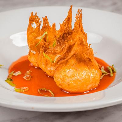 Shrimp wontons in soy chili oil.