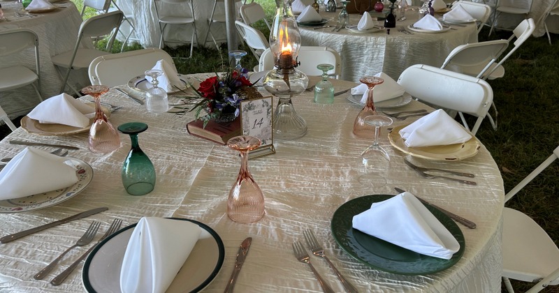A bohemian-style table setting for an outdoor event