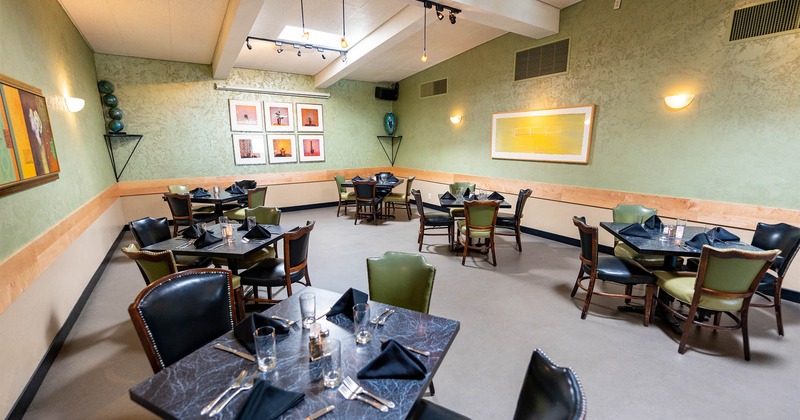 Interior seating space, tables ready for guests