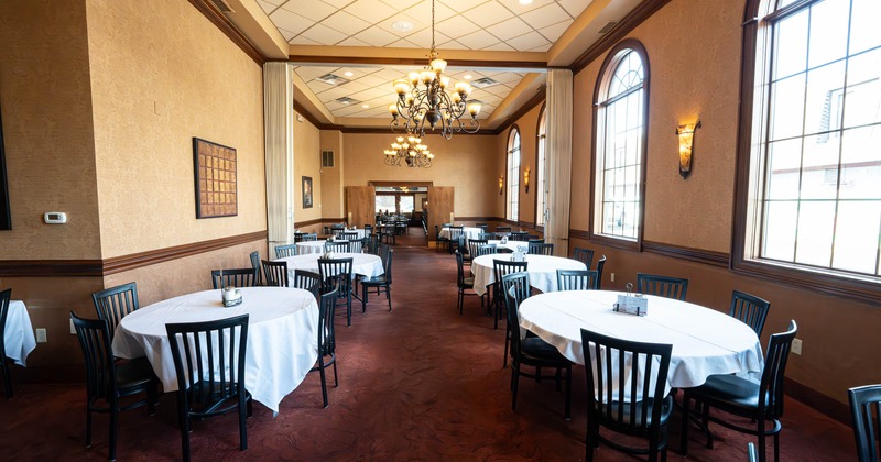 Interior, seating area with ellipse tables