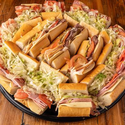 Catering Tray with sandwiches on it.