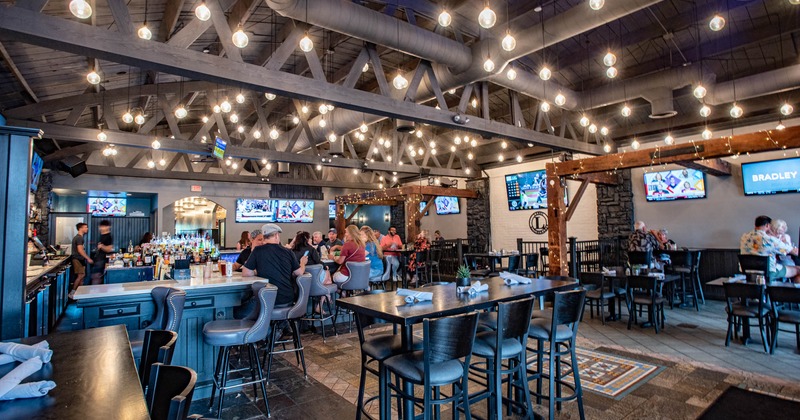 Interior, a crowd of people enjoying in the dining area