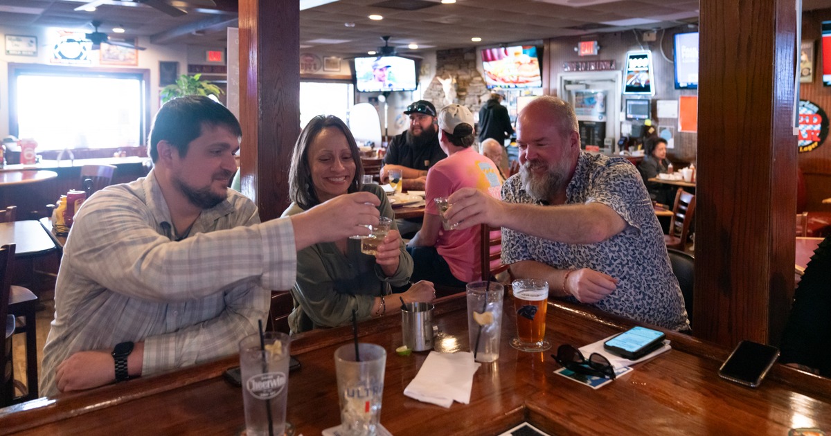 Bar,  the guests are toasting