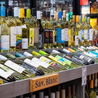 Assorted white wine bottles.