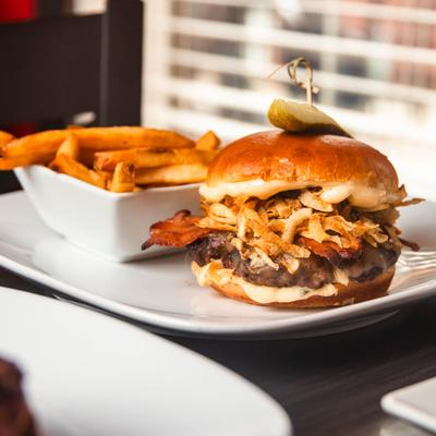The Farmer Burger served with a side of fries.