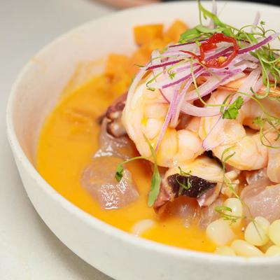 Seafood ceviche with Peruvian Corn, Glazed Sweet Potato, Red Onion