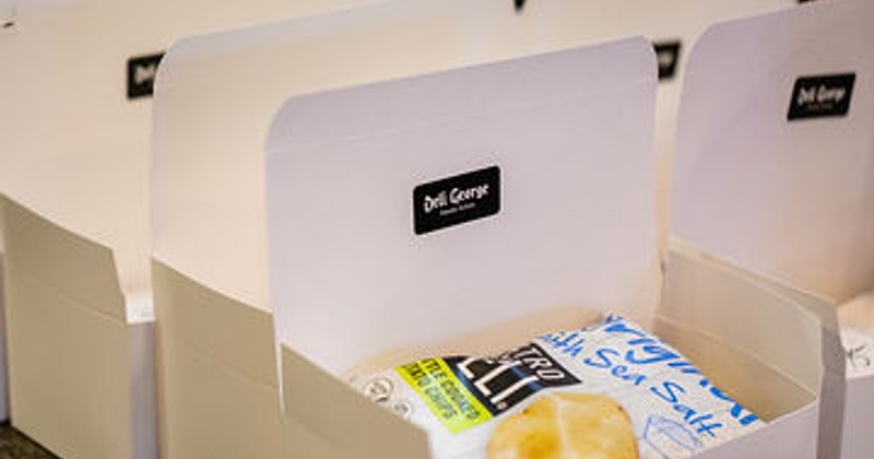 Bags of chips and lunch boxes