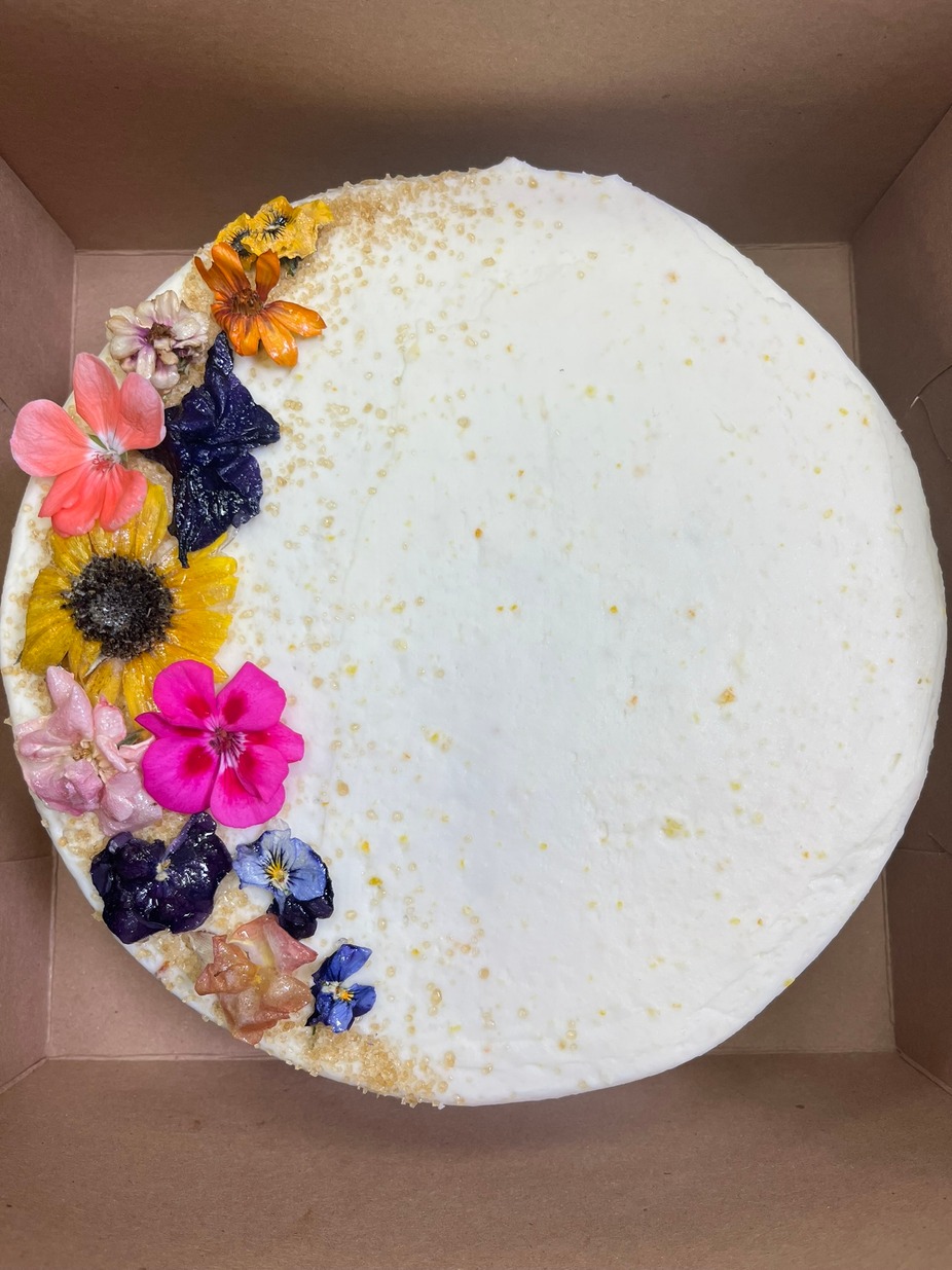 Our Hummingbird Cake is a Southern classic, done up all fancy with cardamom, rose, and edible flowers.