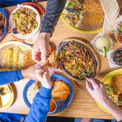 people serving themselves Rancho Dinner.