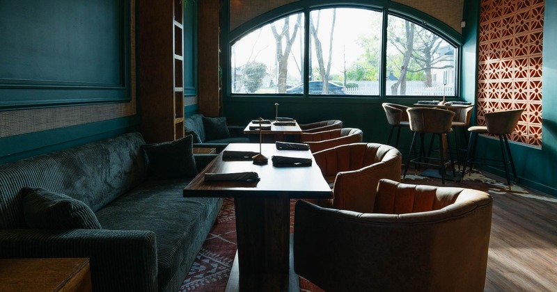 Decorated interior, seating area, tables ready for guests