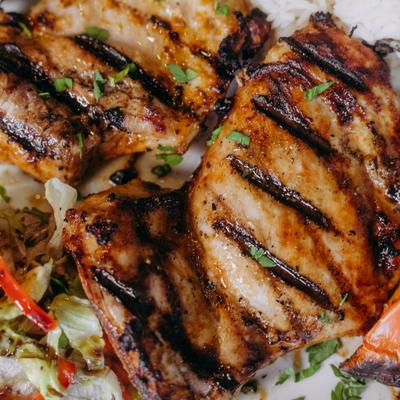 Grilled chicken chops, close-up.