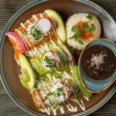 Enchiladas, rice, and beans.