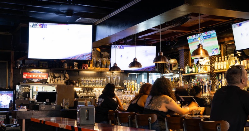 Customers at the bar