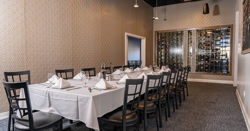 Interior, long table ready for guests