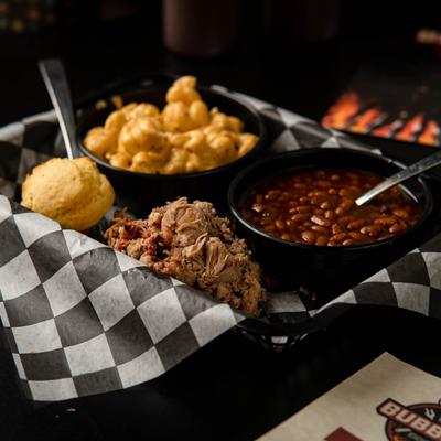 One meat platter - pulled pork with corn muffin, mac and cheese, and BBQ means.