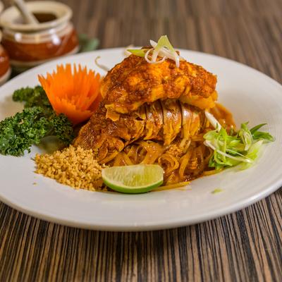 Stir fried noodles, with lobster, scallions, bean sprouts, and crushed peanuts.