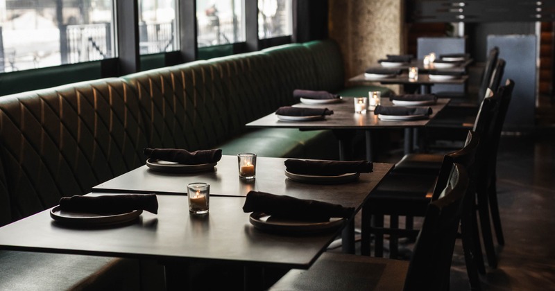Interior, dining area, banquette bench with tables and chairs, seating for four