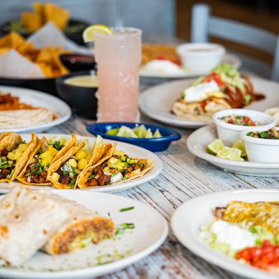 Different food dishes served on the table.
