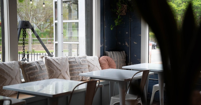 Interior, seating area, tables and padded sofas