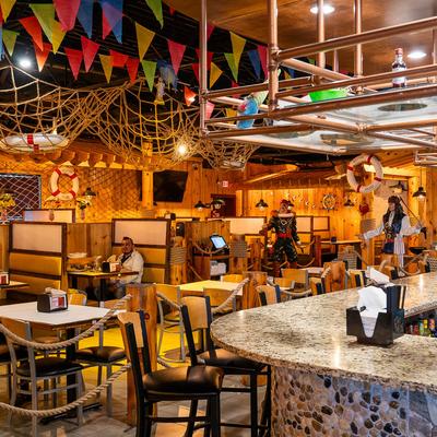 The interior of the dining hall, tables and chairs.